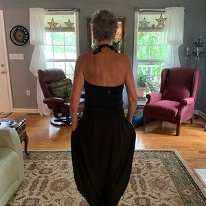 Black halter/strapless jumpsuit. Size Small. Shelf bra. Great condition. Poly